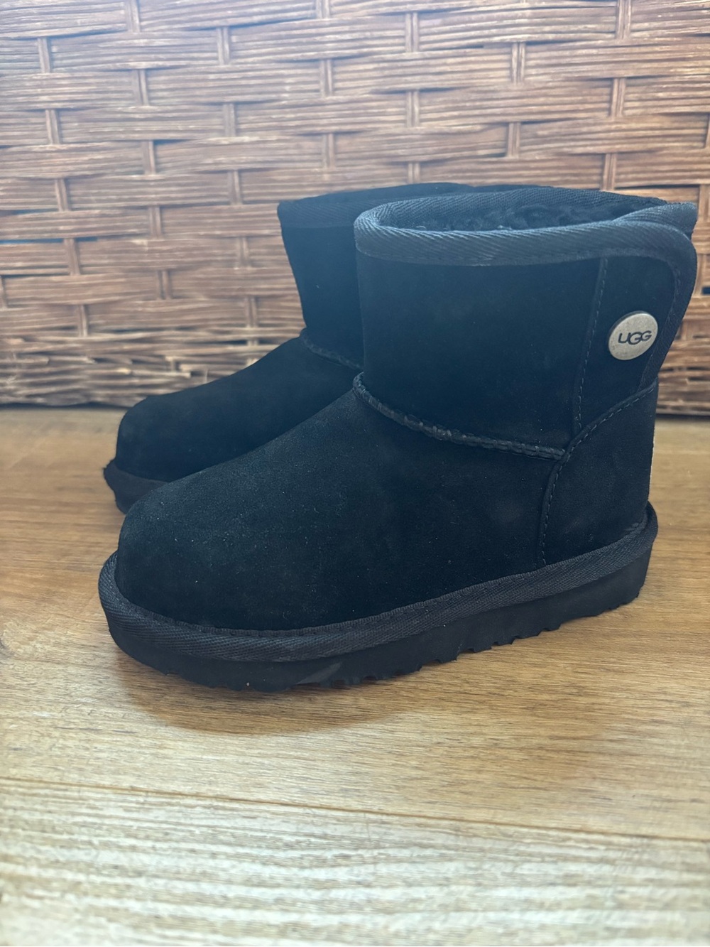 UGG Kids Short Black Suede Boot with Logo Button
